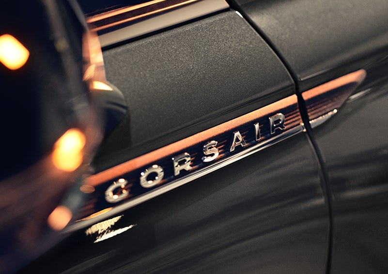 The stylish chrome badge reading “CORSAIR” is shown on the exterior of the vehicle. | Golden Circle Lincoln in Jackson TN