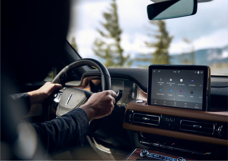 The Lincoln+Alexa app screen is displayed in the center screen of a 2023 Lincoln Aviator® Grand Touring SUV | Golden Circle Lincoln in Jackson TN